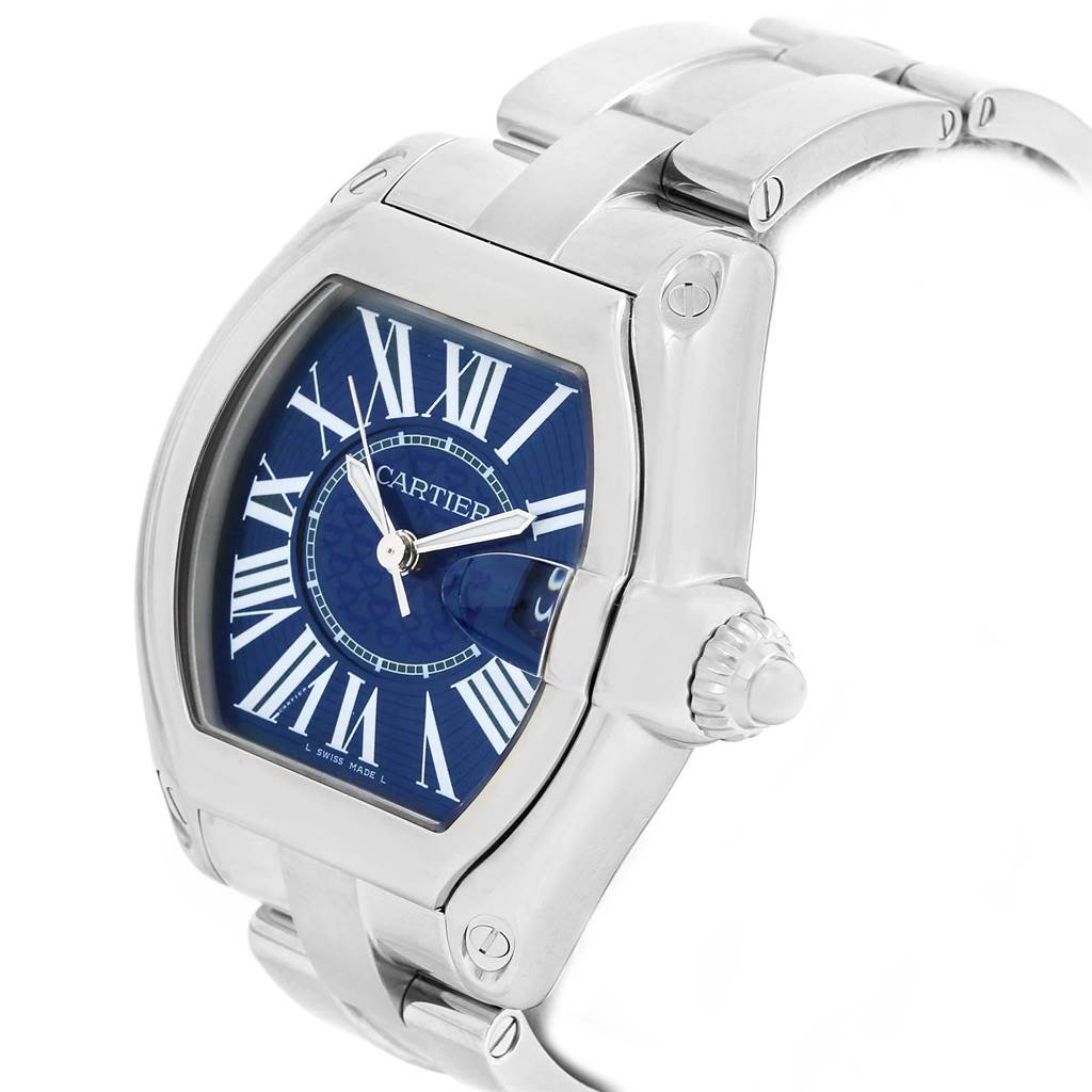 The image shows a close-up angled side view of the Cartier Roadster W6206012 Men
s Stainless Steel Blue Dial W6206012 Men
s Stainless Steel Blue Dial watch, highlighting the dial, case, crown, and part of the bracelet.