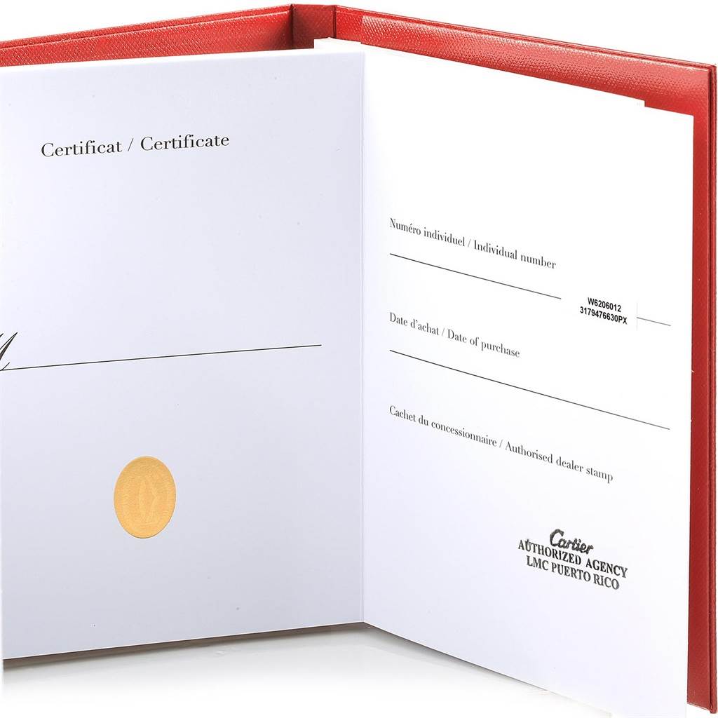 The image shows an opened certificate booklet for the Cartier Roadster W6206012 Men
s Stainless Steel Blue Dial W6206012 Men
s Stainless Steel Blue Dial model watch, displaying purchase details and dealer stamp.