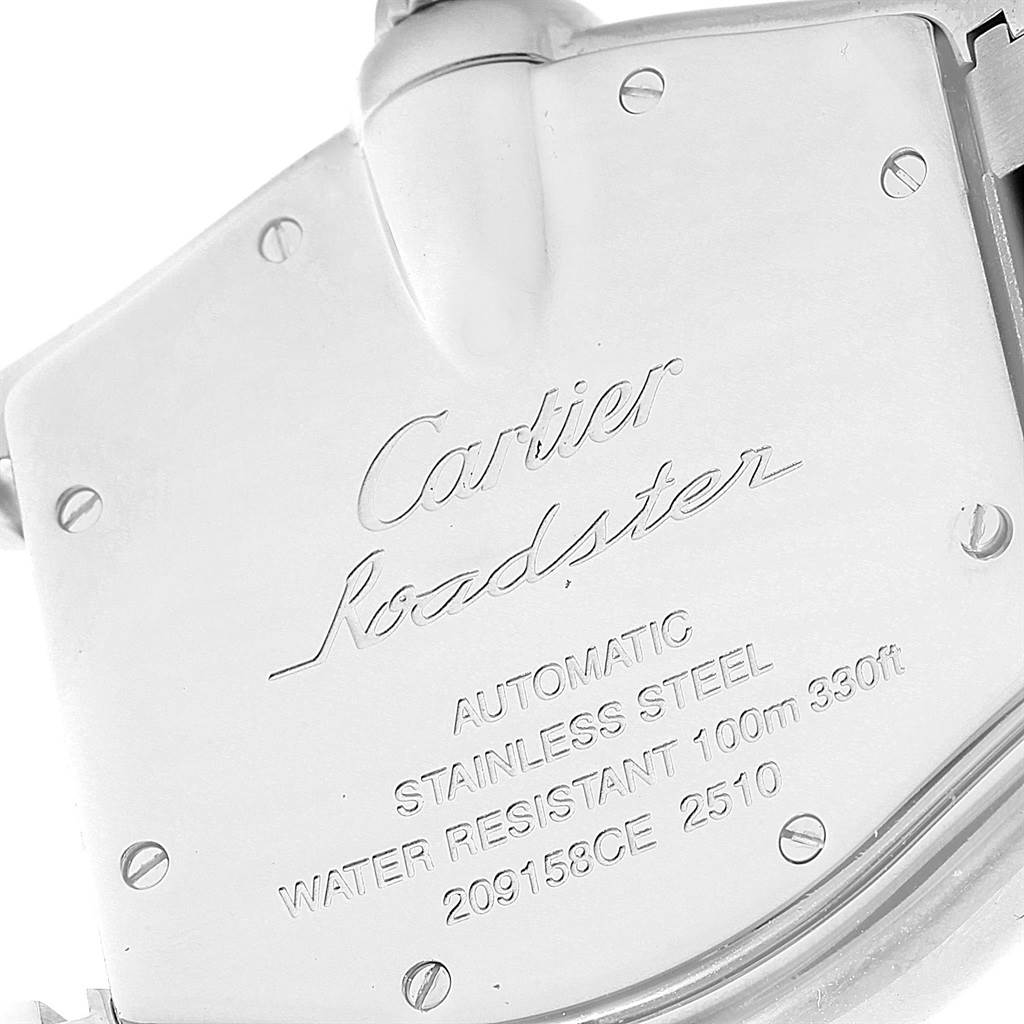The image shows the back case of a Cartier Roadster W62004V3 Men's Stainless Steel Black Dial W62004V3 Men's Stainless Steel Black Dial watch, highlighting its inscriptions and screws.
