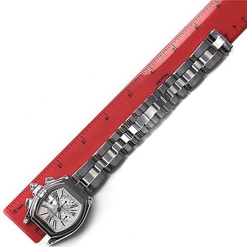 The Cartier Roadster W62019X6 Men's Stainless Steel Silver Dial W62019X6 Men's Stainless Steel Silver Dial watch is shown from a top-down view, alongside a red ruler for scale.