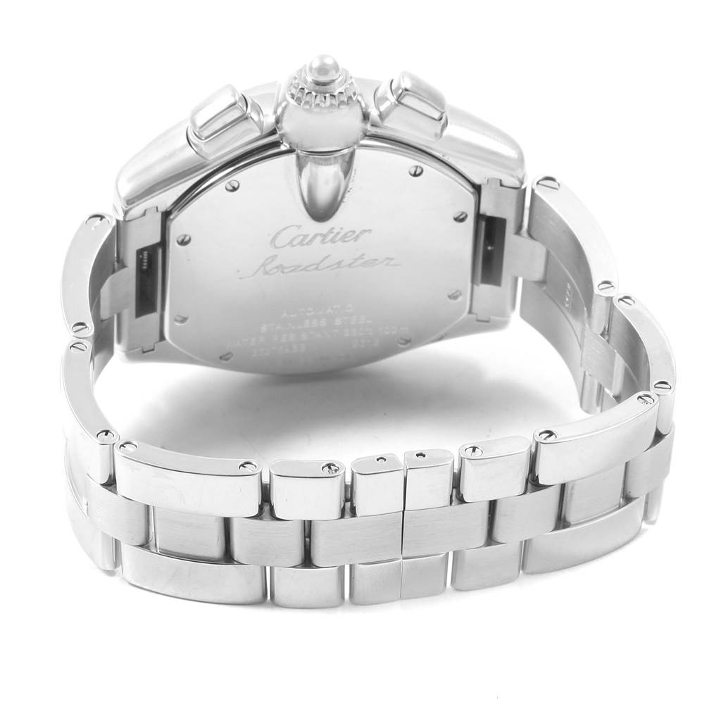 The image shows the back view of a Cartier Roadster W62019X6 Men's Stainless Steel Silver Dial W62019X6 Men's Stainless Steel Silver Dial watch, focusing on the case back, crown, and stainless steel bracelet.