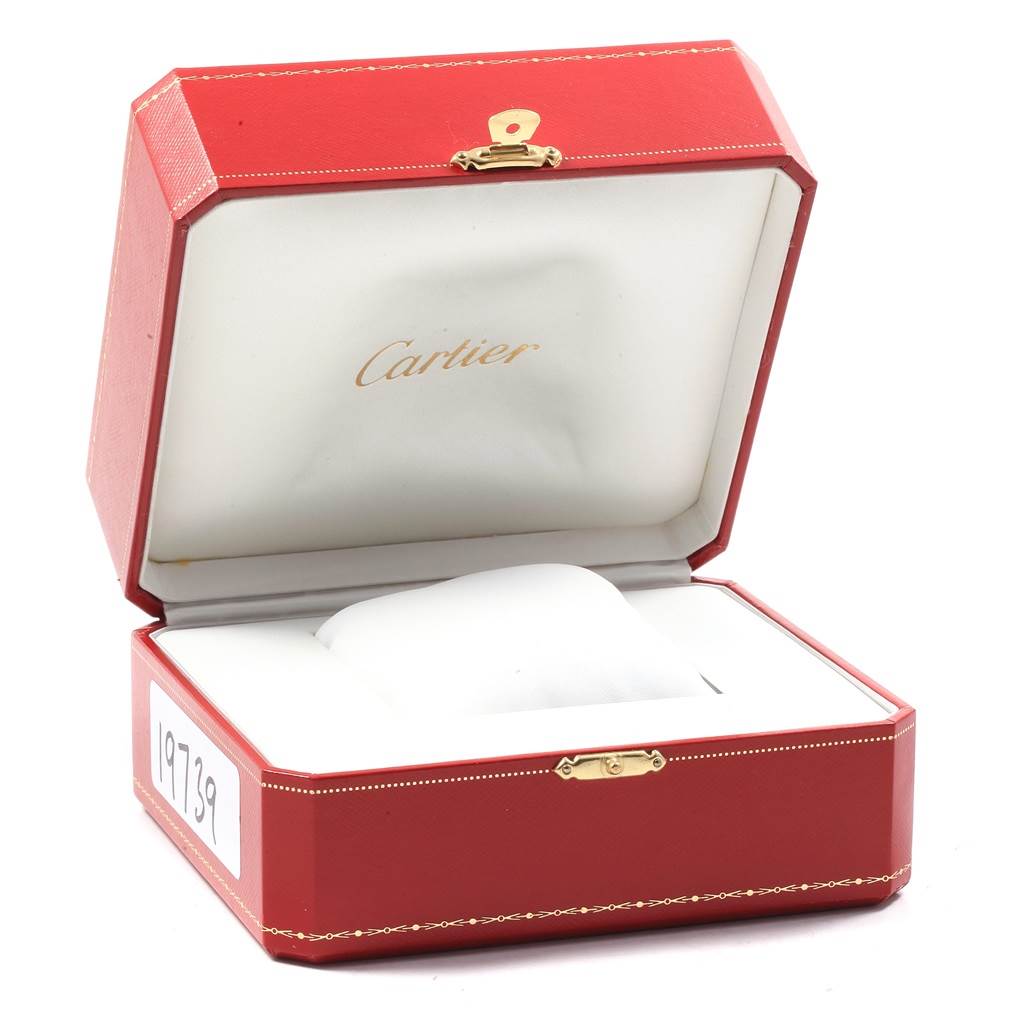 The image shows an open red Cartier box, presumably for the Roadster model watch.