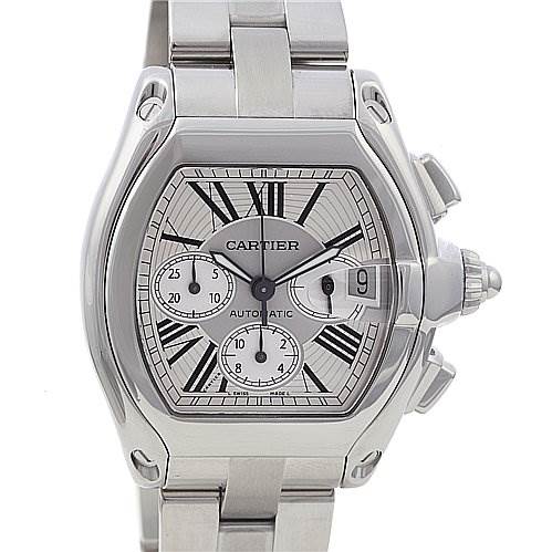 The image shows a close-up, front view of a Cartier Roadster W62019X6 Men's Stainless Steel Silver Dial W62019X6 Men's Stainless Steel Silver Dial model watch, displaying its face, bezel, crown, and part of the bracelet.