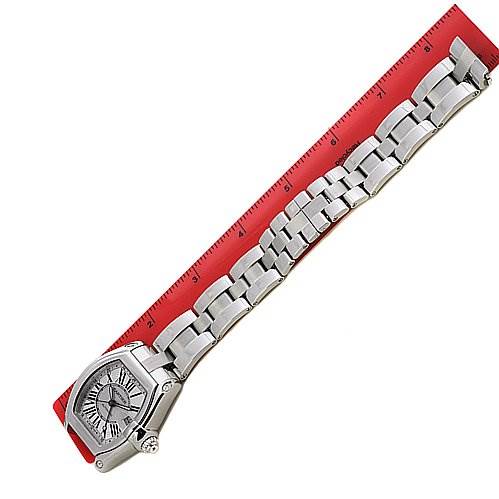 This image shows a Cartier Roadster W62032X6 Men's Stainless Steel Silver Dial W62032X6 Men's Stainless Steel Silver Dial watch at a slight angle, displaying its face and full metal bracelet alongside a ruler.