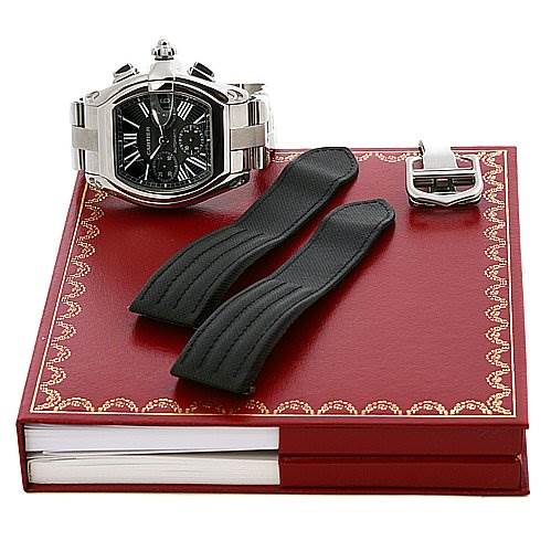 The Cartier Roadster W62020X6 Men's Stainless Steel Black Dial W62020X6 Men's Stainless Steel Black Dial watch is shown from a front angle, along with extra straps and a buckle, placed on a red box.