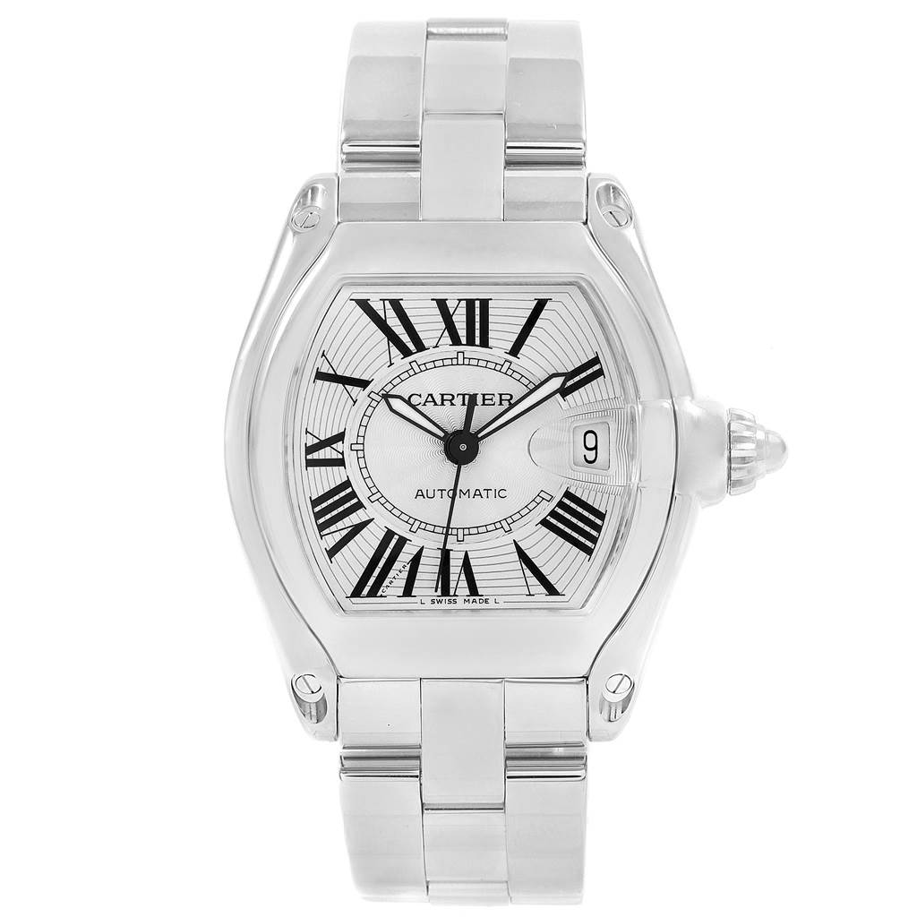 The image shows a frontal view of a Cartier Roadster W62025V3 Men
s Stainless Steel Silver Dial W62025V3 Men
s Stainless Steel Silver Dial watch, displaying the face, Roman numerals, date window, and metal bracelet.