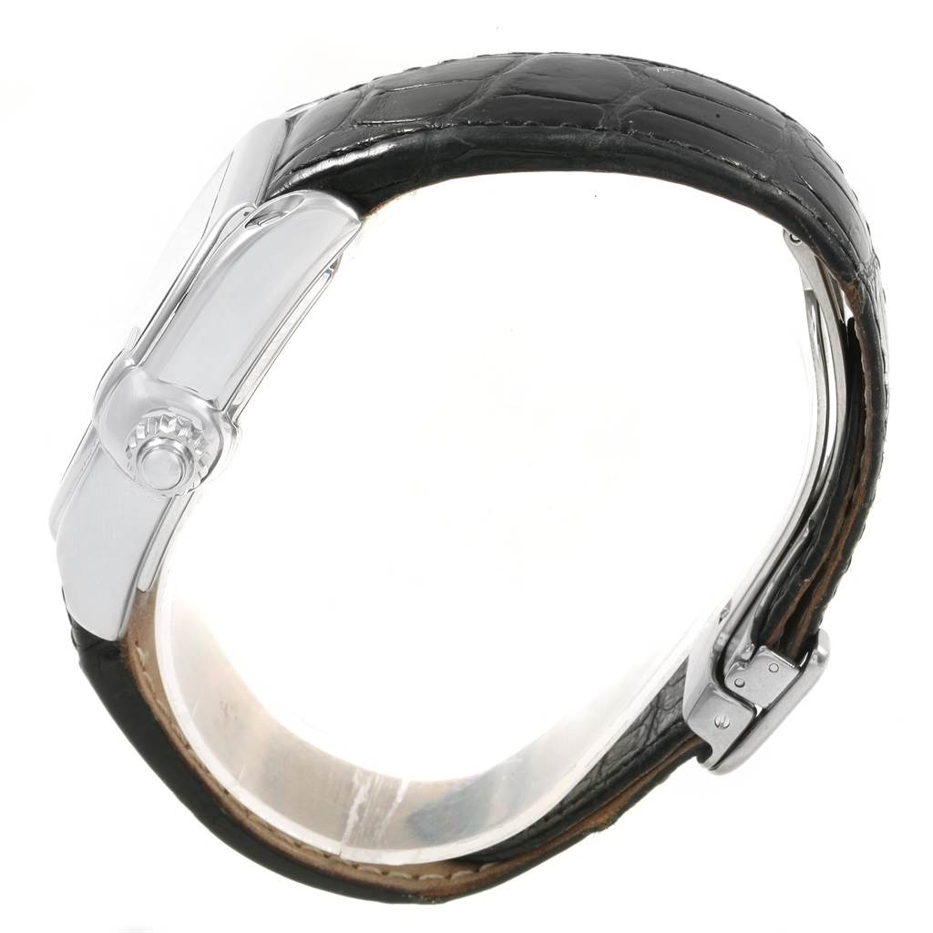 The image shows a side view of the Cartier Roadster W62025V3 Men
s Stainless Steel Silver Dial W62025V3 Men
s Stainless Steel Silver Dial watch, focusing on the case, crown, and black leather strap.