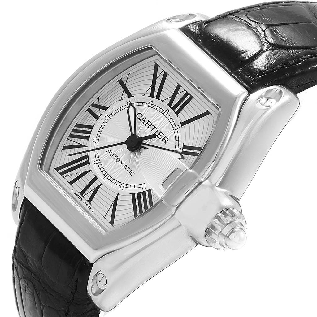 The Cartier Roadster W62025V3 Men
s Stainless Steel Silver Dial W62025V3 Men
s Stainless Steel Silver Dial watch is shown at an angled view highlighting the dial, casing, and leather strap.