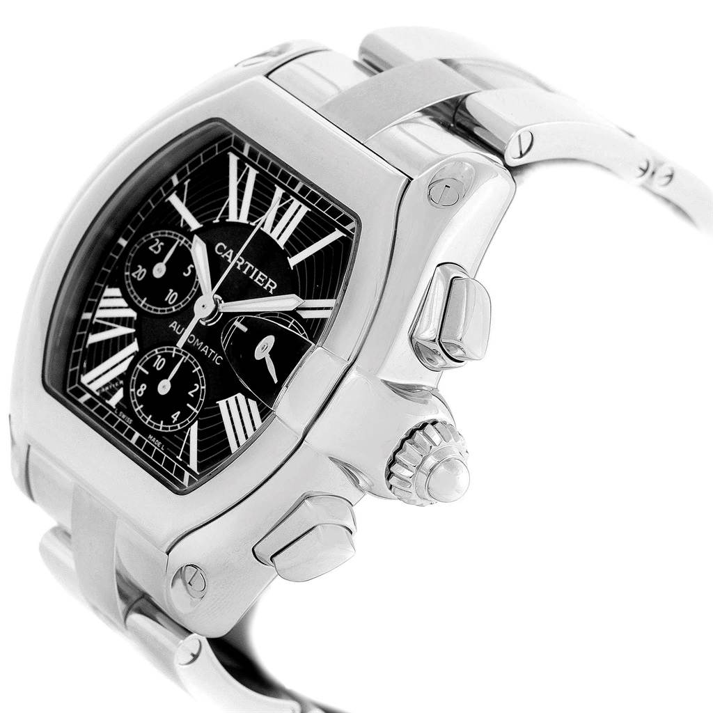 The image shows a close-up side view of the Cartier Roadster W62020X6 Men's Stainless Steel Black Dial W62020X6 Men's Stainless Steel Black Dial watch, highlighting its case, crown, and part of the bracelet.