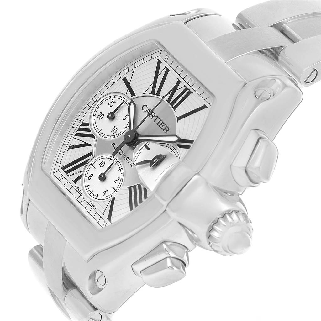 The image shows a Cartier Roadster W62019X6 Men
s Stainless Steel Silver Dial W62019X6 Men
s Stainless Steel Silver Dial watch at an angled close-up, highlighting the face, crown, and part of the bracelet.