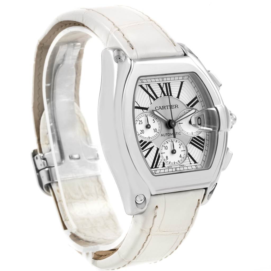 This image shows a Cartier Roadster W62019X6 Men
s Stainless Steel Silver Dial W62019X6 Men
s Stainless Steel Silver Dial watch featuring a silver case, white dial, Roman numerals, and a white leather strap, viewed from an angled perspective.