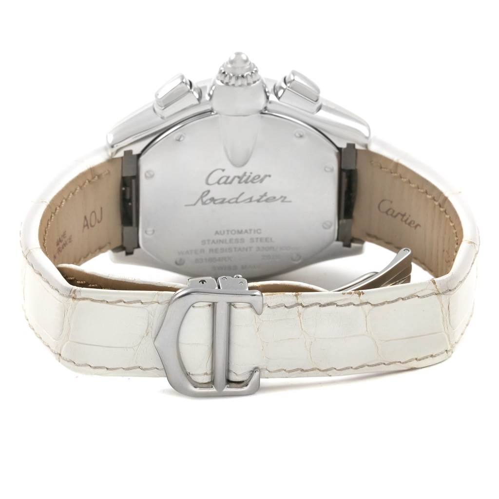 The image shows the back of a Cartier Roadster W62019X6 Men
s Stainless Steel Silver Dial W62019X6 Men
s Stainless Steel Silver Dial watch with its white leather strap and stainless steel clasp.