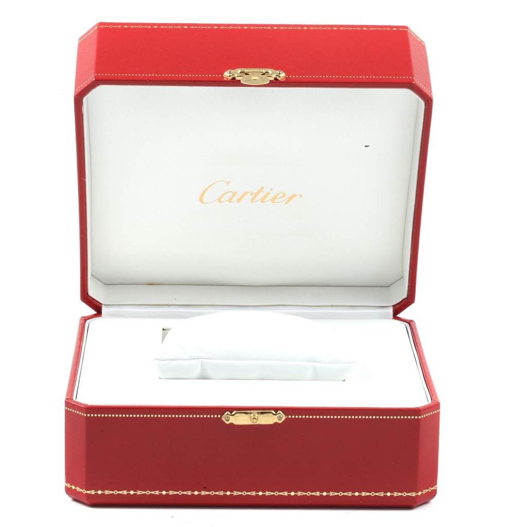 The image shows an open red Cartier box, likely for the Roadster model watch, with an inner cushion for the watch.