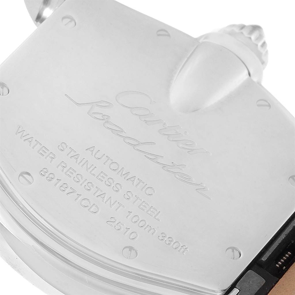 The image shows a close-up of the back case and part of the crown of a Cartier Roadster W62002V3 Men
s Stainless Steel Black Dial W62002V3 Men
s Stainless Steel Black Dial watch.