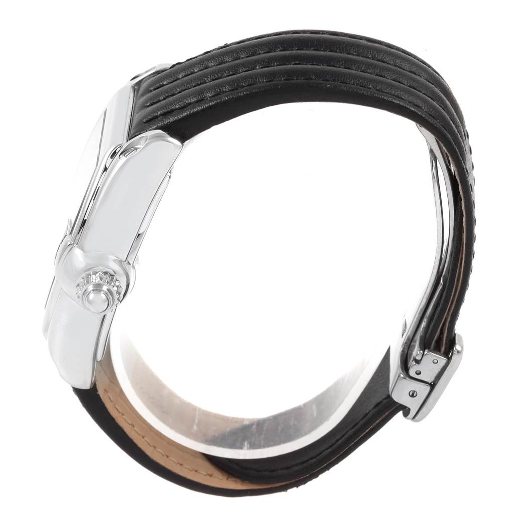 The image shows a side view of the Roadster model by Cartier, highlighting the crown and strap detailing.