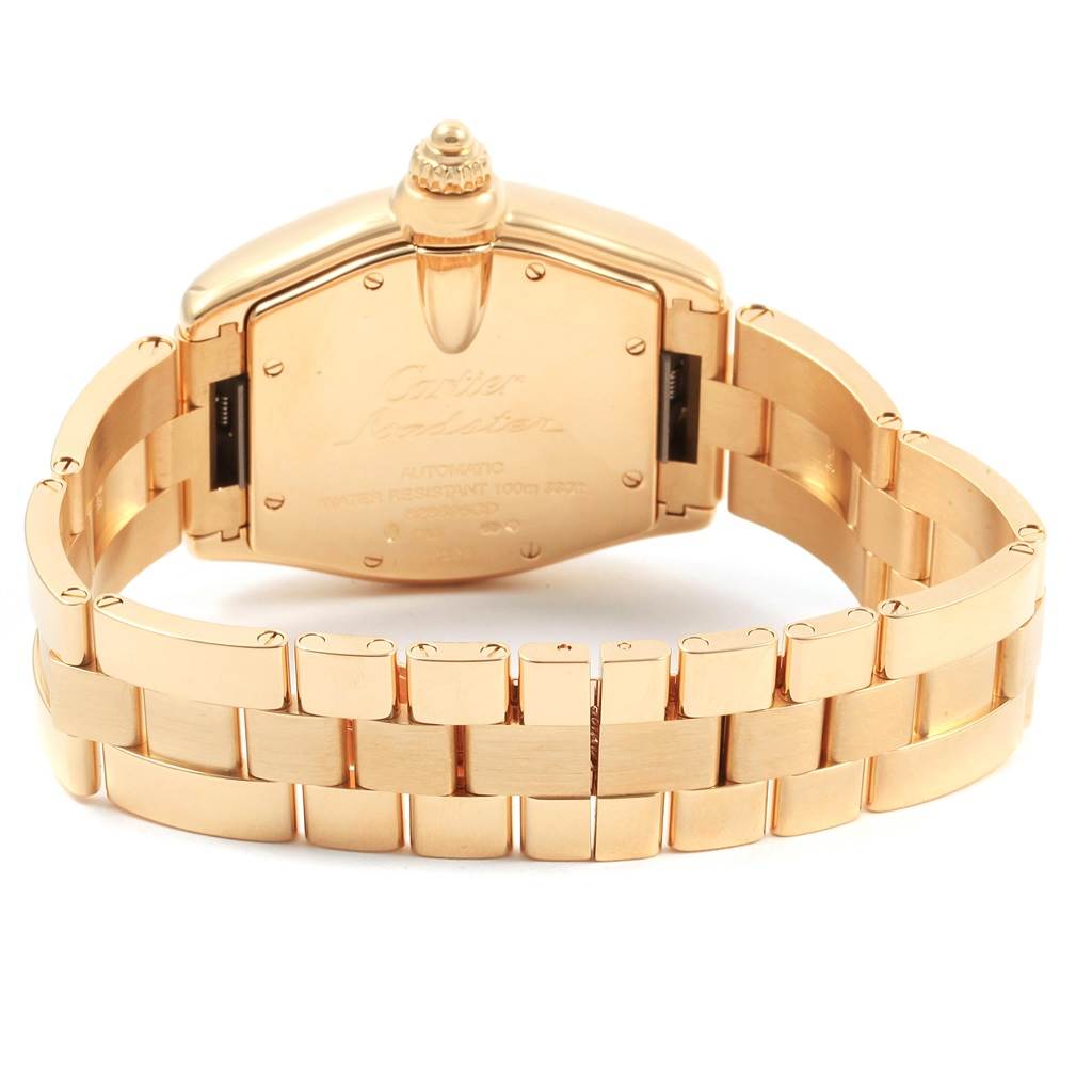 The image shows the back case and bracelet of a Cartier Roadster W62005V1 Men's Yellow Gold Silver Dial W62005V1 Men's Yellow Gold Silver Dial watch from a rear angle.