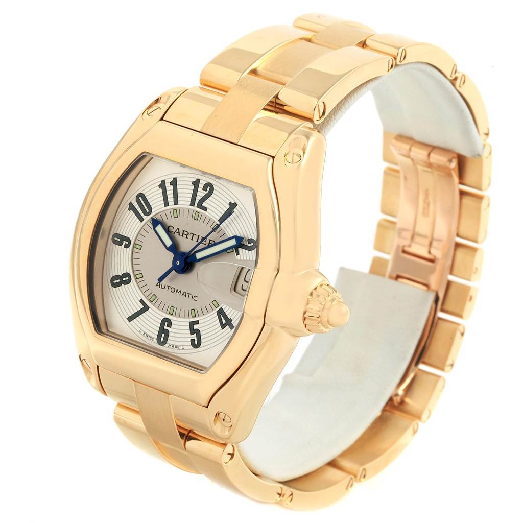 This image shows a Cartier Roadster W62005V1 Men's Yellow Gold Silver Dial W62005V1 Men's Yellow Gold Silver Dial watch, angled to display the face, crown, and part of the bracelet.
