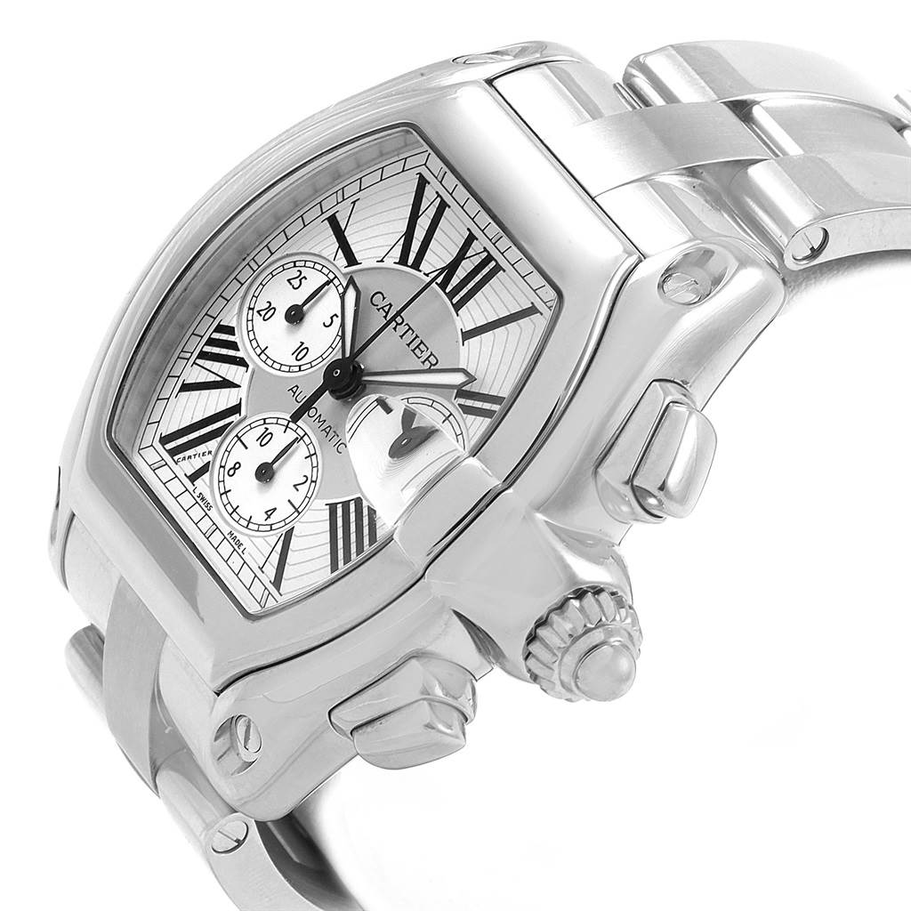 The image shows a close-up angle of the Cartier Roadster W62019X6 Men's Stainless Steel Silver Dial W62019X6 Men's Stainless Steel Silver Dial watch, highlighting its dial, crown, and part of the bracelet.