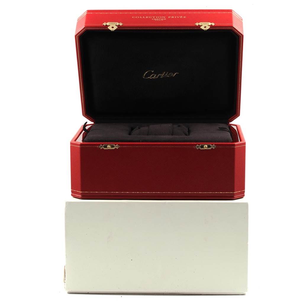 The image shows an open red Cartier watch box for the Roadster model.