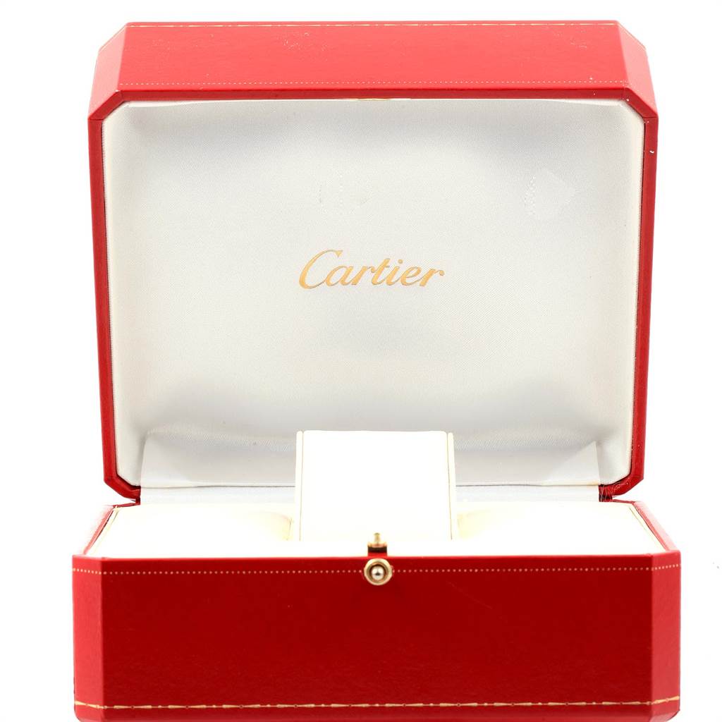 This image shows the open box of a Roadster model Cartier watch, highlighting the brand name inside the box lid.