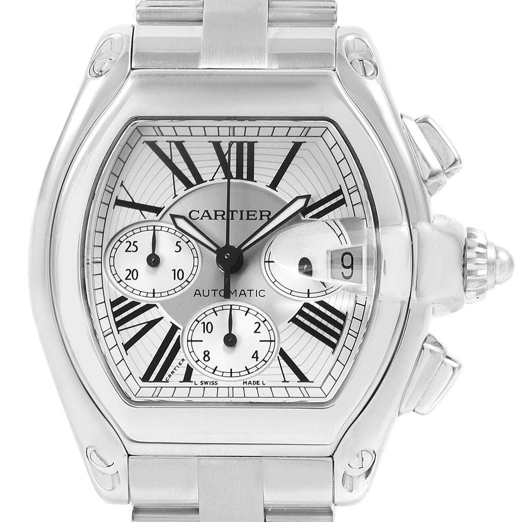 The image shows a Cartier Roadster W62019X6 Men's Stainless Steel Silver Dial W62019X6 Men's Stainless Steel Silver Dial watch from the front, highlighting its silver dial, date window, chronograph subdials, and stainless steel case.