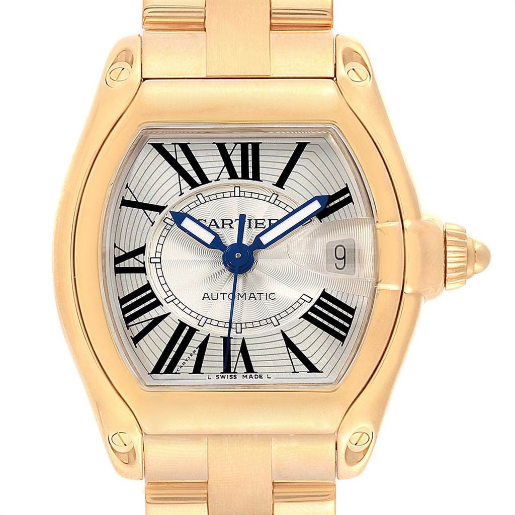 This image shows the face and bezel of a Cartier Roadster W62005V1 Men's Yellow Gold Silver Dial W62005V1 Men's Yellow Gold Silver Dial watch from a front angle.