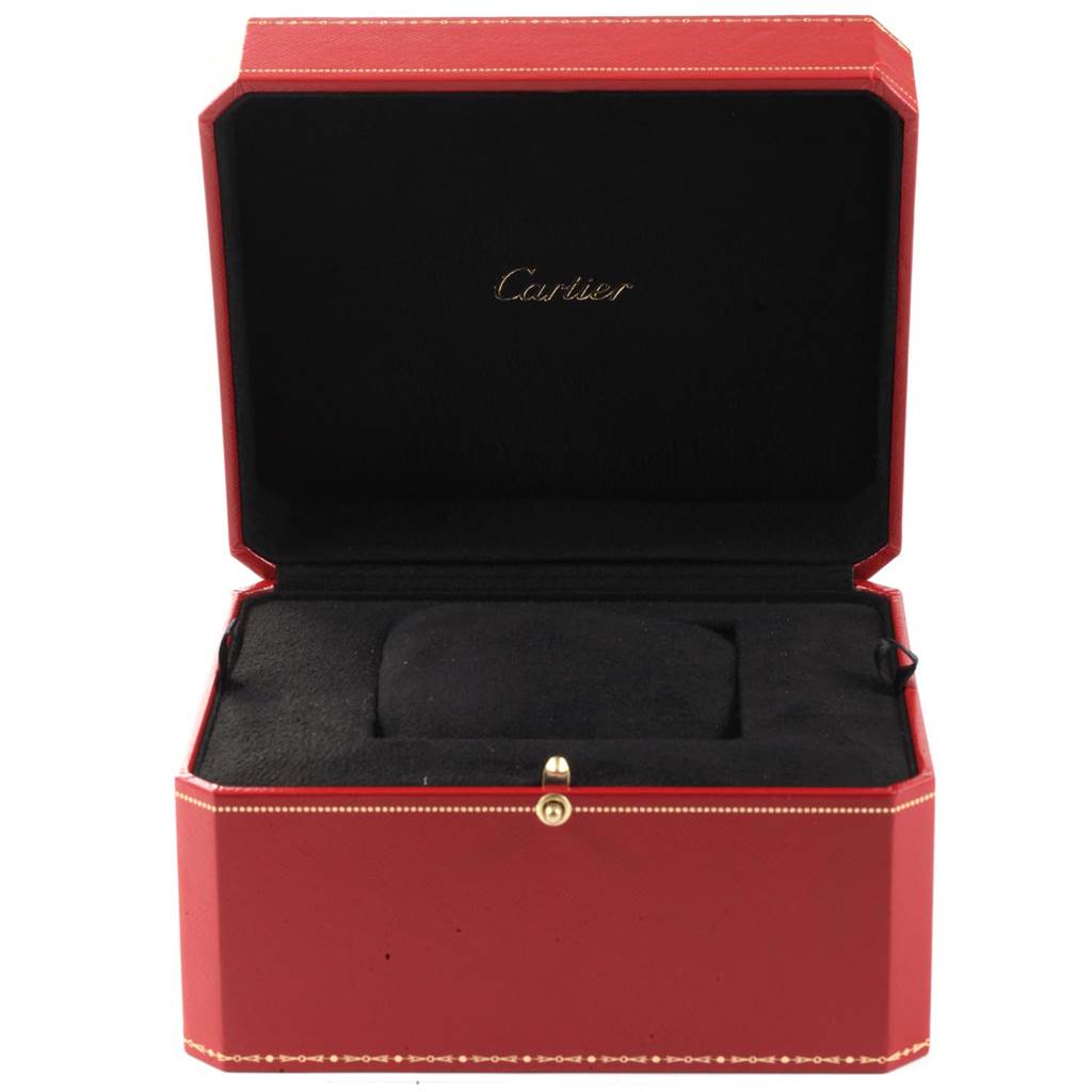 This image shows an open red and black Cartier watch box, likely for the Roadster model.