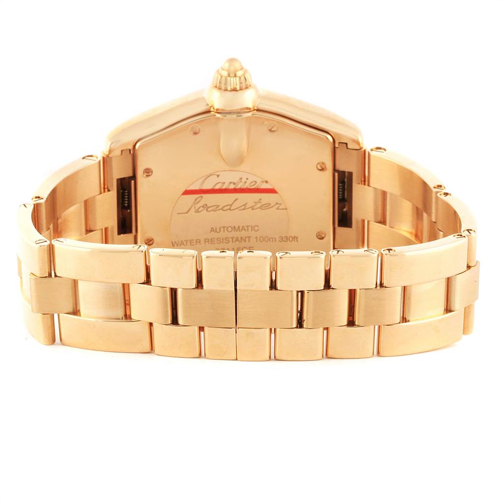The image shows the back view of a Cartier Roadster W62005V1 Men's Yellow Gold Silver Dial W62005V1 Men's Yellow Gold Silver Dial watch, focusing on its clasp and linked bracelet.