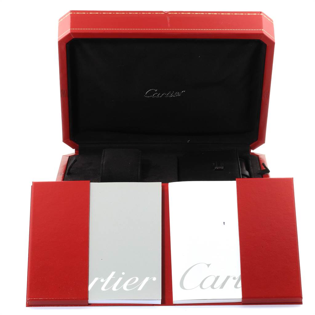 The image shows the packaging and manuals for a Cartier Roadster W62020X6 Men's Stainless Steel Black Dial W62020X6 Men's Stainless Steel Black Dial watch, including a red box and booklets.