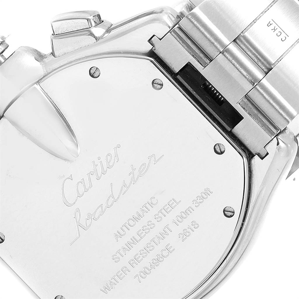 This image shows the back case of a Cartier Roadster W62020X6 Men's Stainless Steel Black Dial W62020X6 Men's Stainless Steel Black Dial watch with the engraving and part of the stainless steel band.