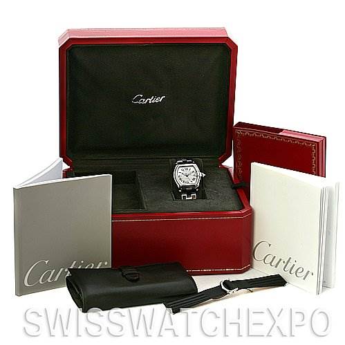 The image shows a Cartier Roadster W62025V3 Men's Stainless Steel Silver Dial W62025V3 Men's Stainless Steel Silver Dial watch along with its red box, manuals, a leather case, and an extra strap.