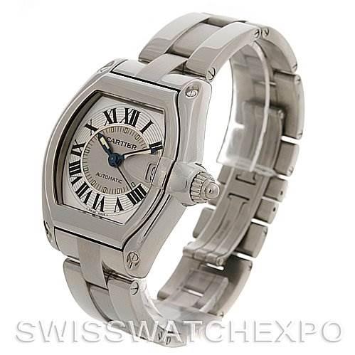 The image shows the Cartier Roadster W62025V3 Men's Stainless Steel Silver Dial W62025V3 Men's Stainless Steel Silver Dial watch from a front-side angle, featuring its face, bracelet, and crown.
