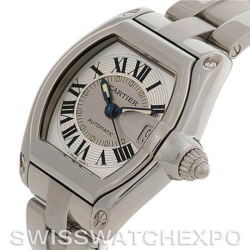 The image shows a close-up angle of the Cartier Roadster W62025V3 Men's Stainless Steel Silver Dial W62025V3 Men's Stainless Steel Silver Dial watch, highlighting the dial, crown, and part of the stainless steel bracelet.
