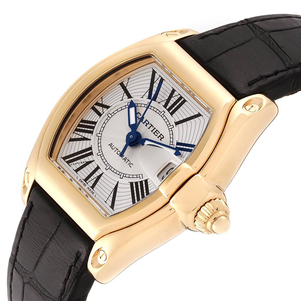 This Cartier Roadster W62005V2 Men's Yellow Gold Silver Dial W62005V2 Men's Yellow Gold Silver Dial watch is shown from an angled view, showcasing the face, bezel, crown, and strap.