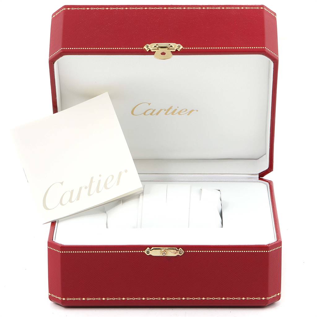 The image shows an open Cartier watch box with a booklet for the Roadster model.