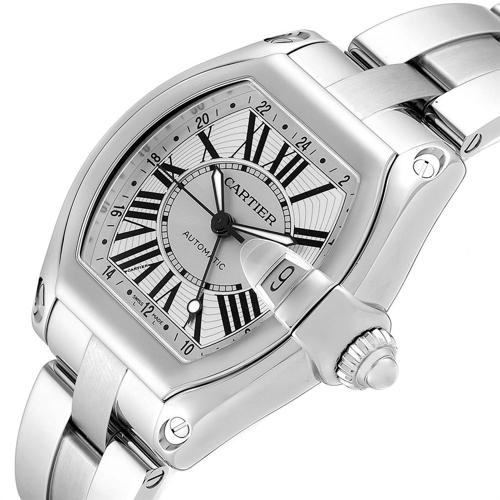 The image shows a close-up angle of the Cartier Roadster W62032X6 Men's Stainless Steel Silver Dial W62032X6 Men's Stainless Steel Silver Dial watch, highlighting the face, bezel, crown, and part of the metal bracelet.