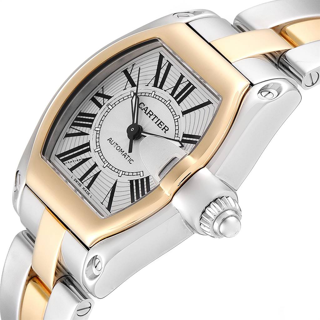 The image shows a close-up of the Cartier Roadster W62031Y4 Men's Steel and Gold (two tone) Silver Dial W62031Y4 Men's Steel and Gold (two tone) Silver Dial watch, highlighting the dial, case, crown, and part of the bracelet.