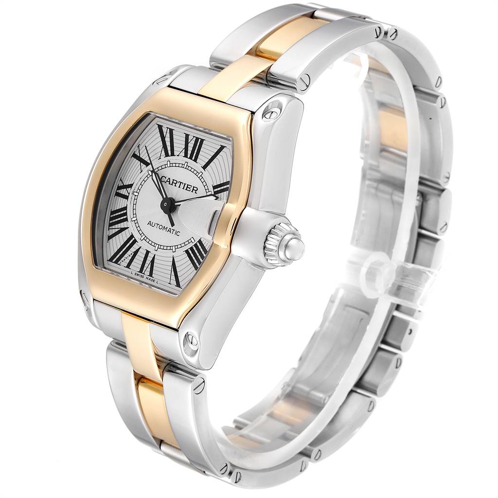 The Cartier Roadster W62031Y4 Men's Steel and Gold (two tone) Silver Dial W62031Y4 Men's Steel and Gold (two tone) Silver Dial watch is shown at a three-quarter angle, highlighting its dial, bezel, bracelet, and crown.