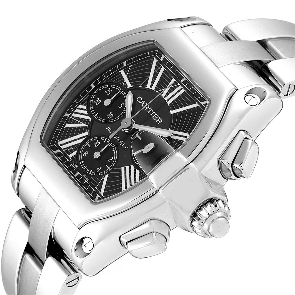The image shows a close-up angle of a Cartier Roadster W62020X6 Men
s Stainless Steel Black Dial W62020X6 Men
s Stainless Steel Black Dial watch, highlighting the dial, crown, and portion of the bracelet.