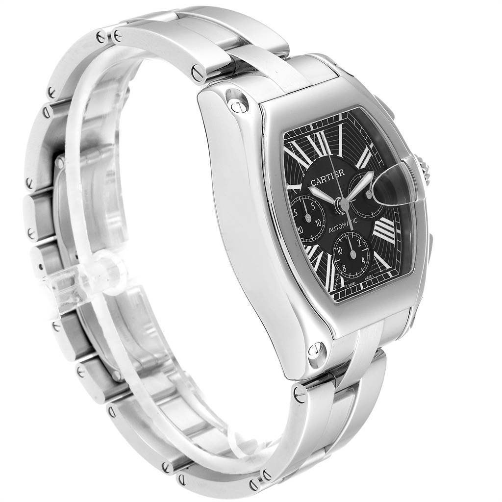 The image shows a Cartier Roadster W62020X6 Men's Stainless Steel Black Dial W62020X6 Men's Stainless Steel Black Dial watch at a three-quarter angle, highlighting its face, bracelet, and unique shape.