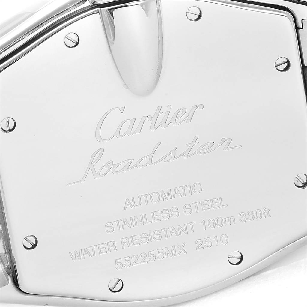 The image shows the back case of a Cartier Roadster W62041V3 Men's Stainless Steel Black Dial W62041V3 Men's Stainless Steel Black Dial watch, highlighting its inscriptions and screws.