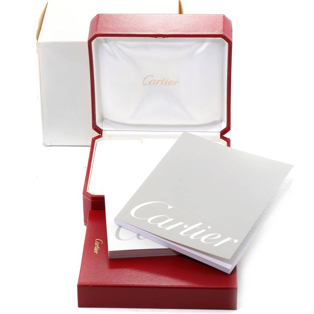 The image shows an open Cartier Roadster W62019X6 Men's Stainless Steel Silver Dial W62019X6 Men's Stainless Steel Silver Dial watch box with accompanying documents and packaging.