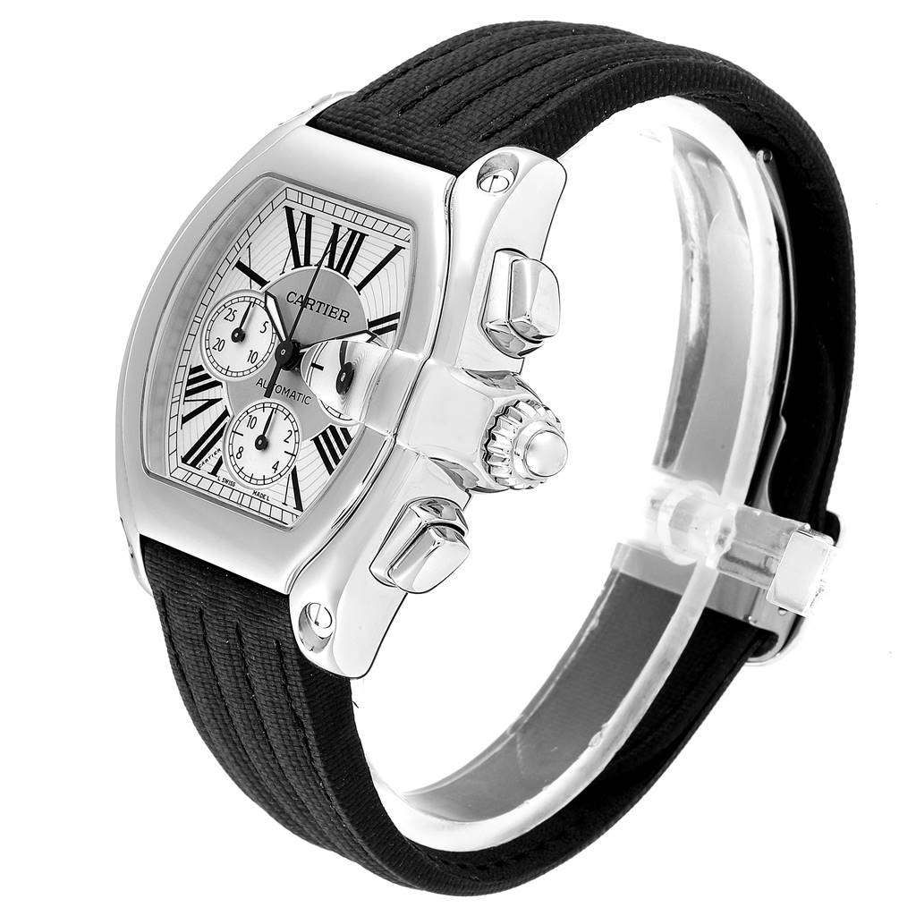 The Cartier Roadster W62019X6 Men's Stainless Steel Silver Dial W62019X6 Men's Stainless Steel Silver Dial watch is shown at an oblique angle, highlighting its dial, case, crown, and black strap.