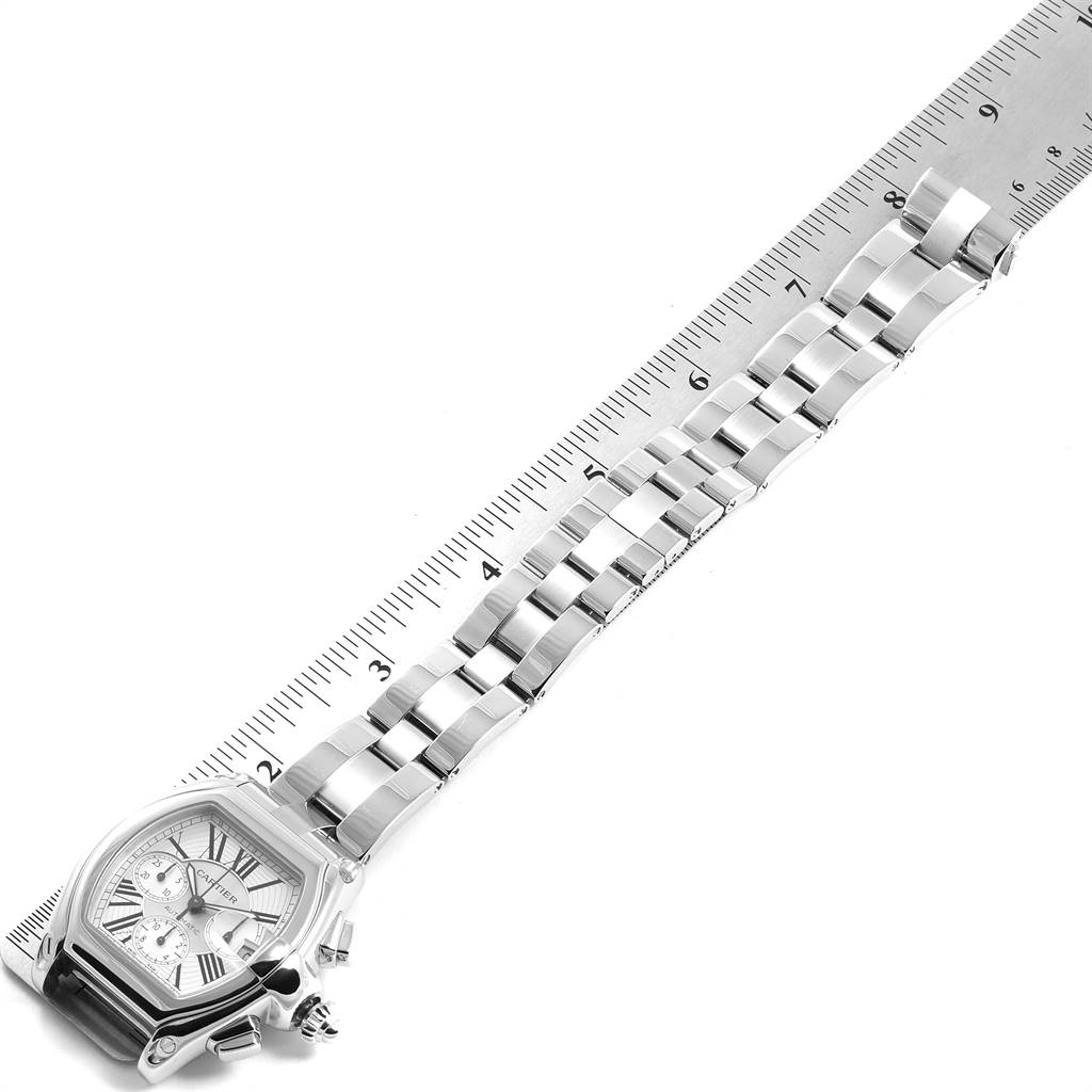 This Cartier Roadster W62019X6 Men's Stainless Steel Silver Dial W62019X6 Men's Stainless Steel Silver Dial model watch is shown diagonally with a focus on its face and metal bracelet, measured with a ruler.