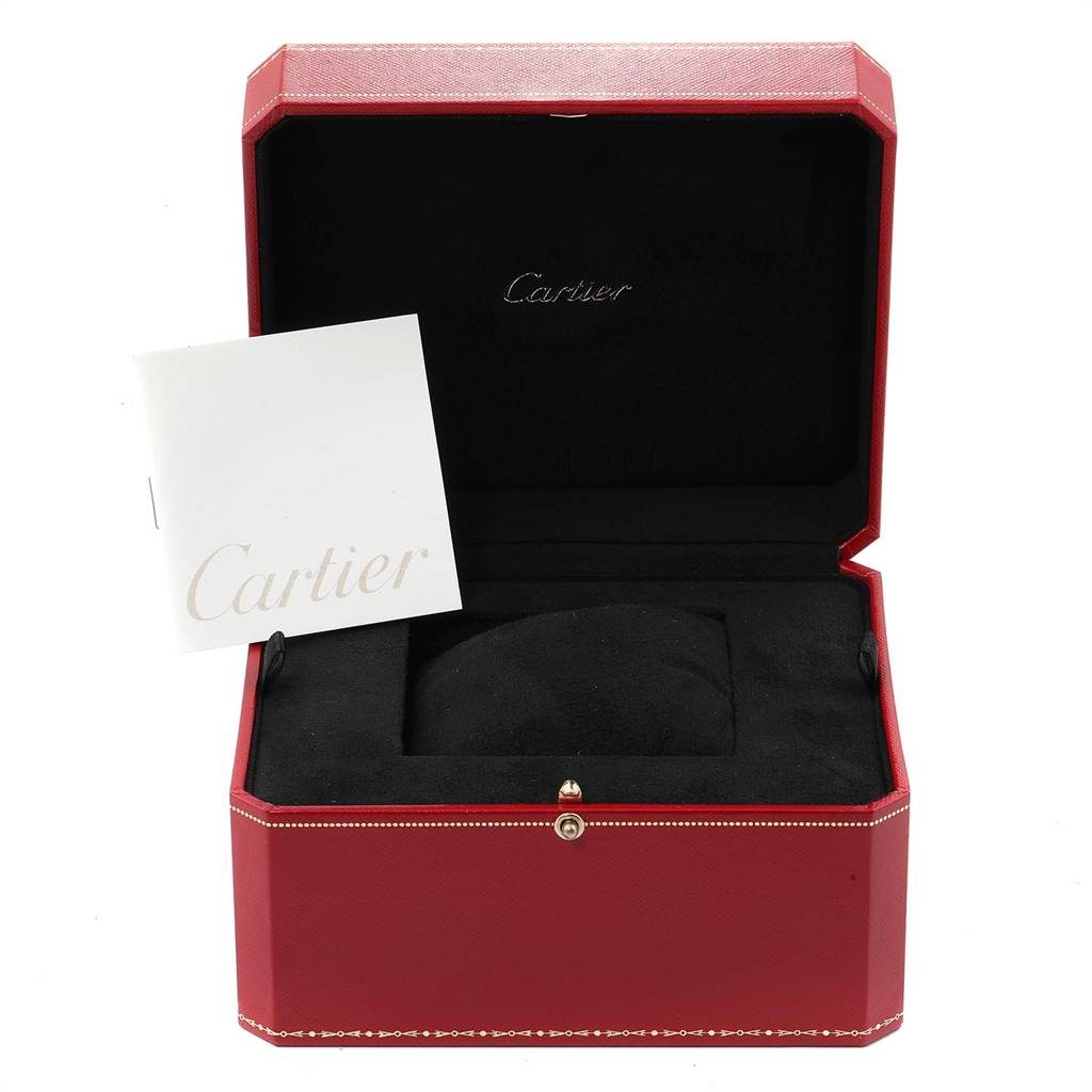 The image shows an open Cartier Roadster W62019X6 Men's Stainless Steel Silver Dial W62019X6 Men's Stainless Steel Silver Dial watch box with a black interior and a Cartier booklet.