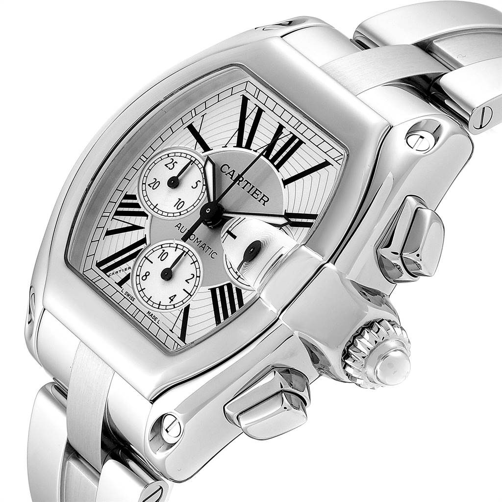 The image shows a close-up, angled view of the Cartier Roadster W62019X6 Men
s Stainless Steel Silver Dial W62019X6 Men
s Stainless Steel Silver Dial watch, detailing the dial, crown, and part of the bracelet.