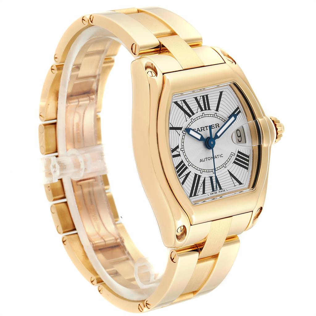 This image shows a Cartier Roadster W62005V2 Men's Yellow Gold Silver Dial W62005V2 Men's Yellow Gold Silver Dial watch angled to display the face, bezel, band, and crown.