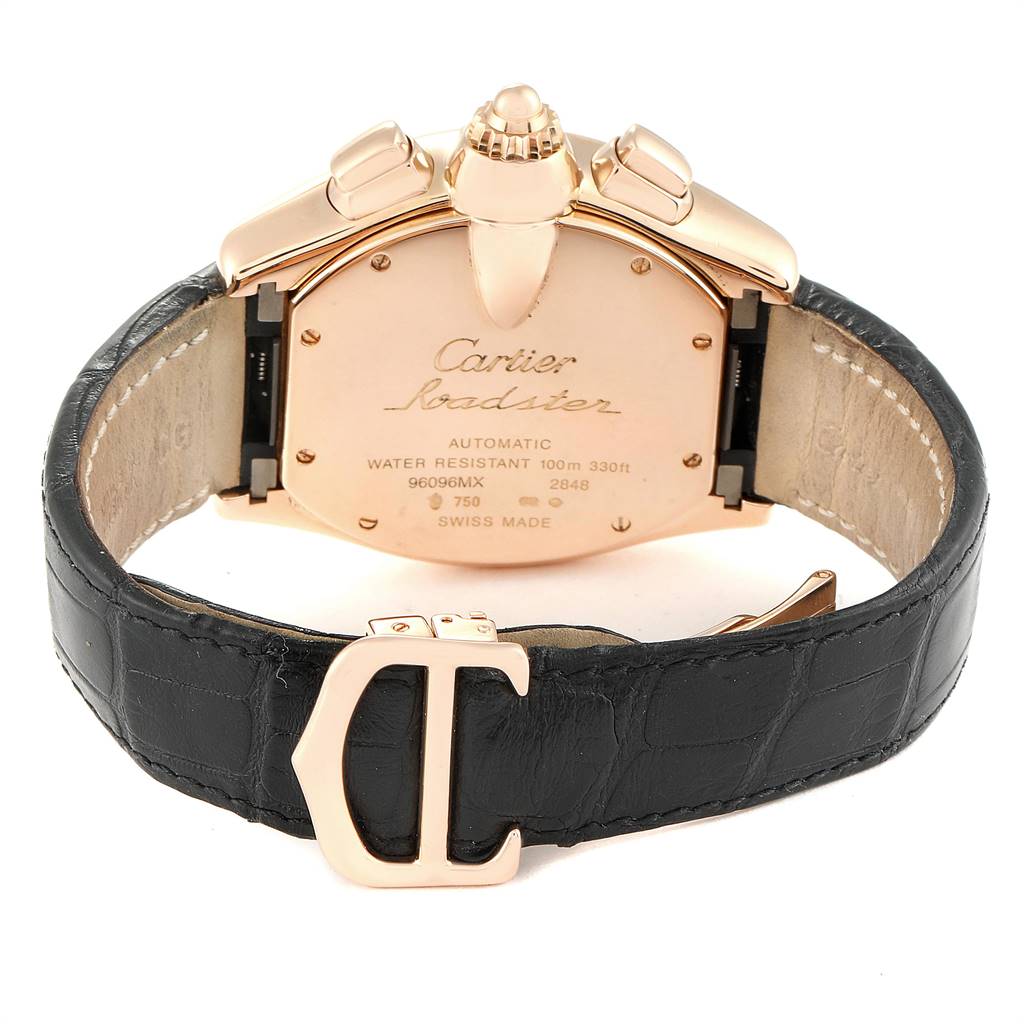 The image shows the back side of a Cartier Roadster W62042Y5 Men's Rose Gold Brown Dial W62042Y5 Men's Rose Gold Brown Dial watch along with its clasp detail.