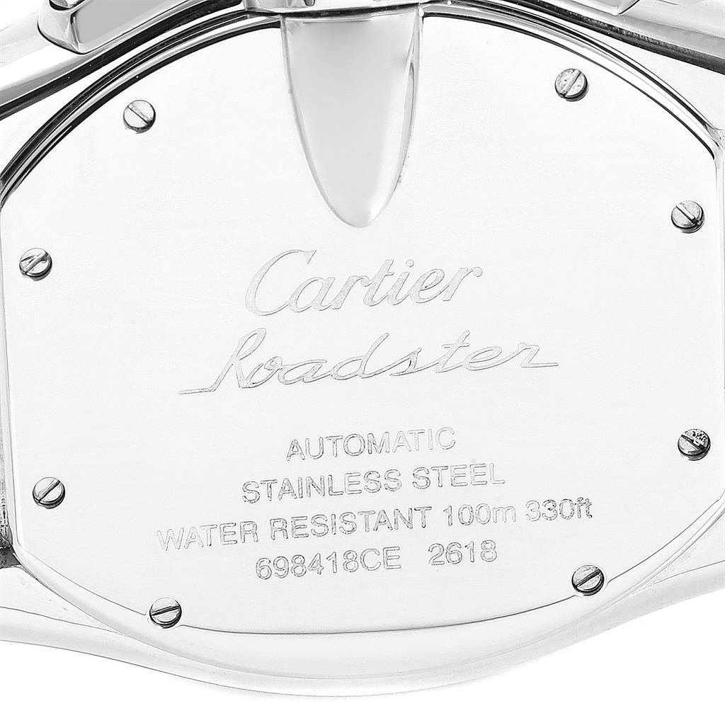 The image shows the case back of a Cartier Roadster W62020X6 Men
s Stainless Steel Black Dial W62020X6 Men
s Stainless Steel Black Dial watch, highlighting its engravings and screws.