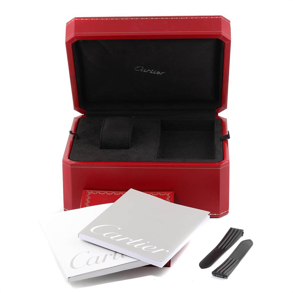 This image shows a Cartier Roadster W62020X6 Men
s Stainless Steel Black Dial W62020X6 Men
s Stainless Steel Black Dial watch box with booklets and two extra straps.